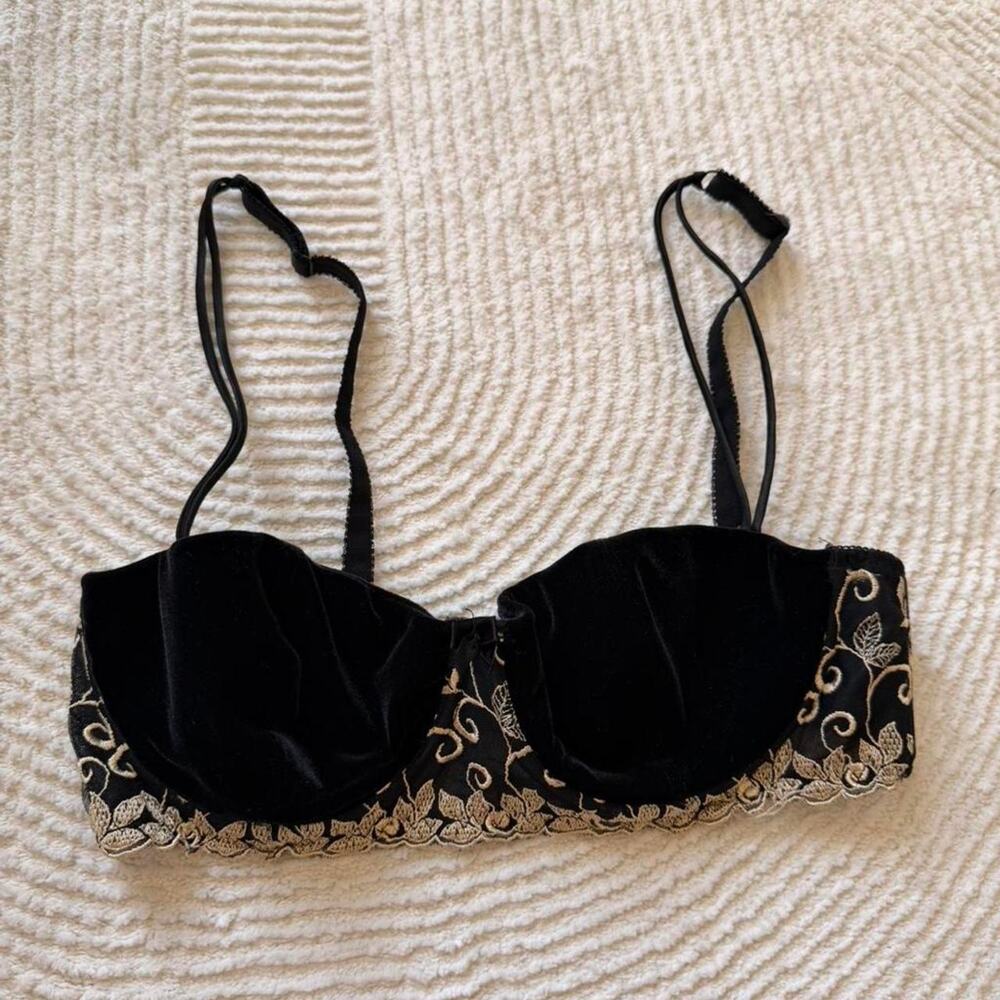 Black velvet bralette with gold accents